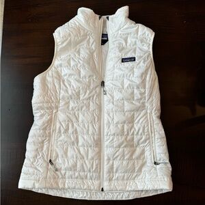 Patagonia women’s nano puff vest in birch white, size large.